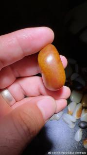 收藏级新疆和田玉籽料原石,27.6克,真皮真色
